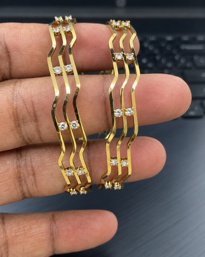 Antique Matte Gold Wave Bangles with Sparkling Stones