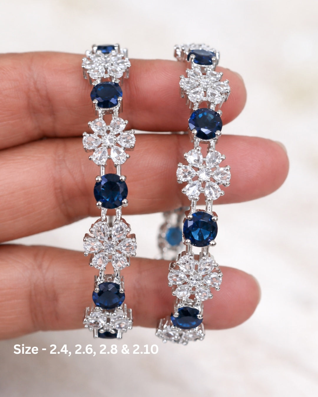 Rhodium Plated Blue Color Circle and Flower Zircon Stone Bangle (Set of 2) | Premium Quality | American Diamond | Party wear | TE-ADB-2212-007