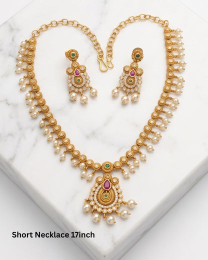 Traditional Gold-Tone(Matte Finish) Necklace Set with Ruby, Green Stones & Pearl Drops
