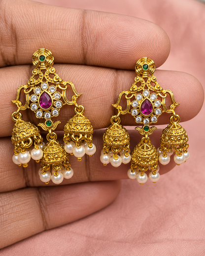 Traditional Gold-Tone Jhumka Earrings with Ruby, Green Stones & Pearl Drops
