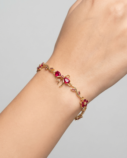 Ruby Bloom Gold Bracelet with Floral & Bow Design | Premium Quality | Cubic Zirconia
