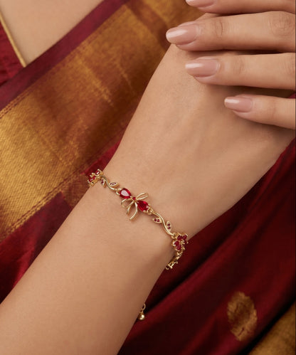Ruby Bloom Gold Bracelet with Floral & Bow Design | Premium Quality | Cubic Zirconia